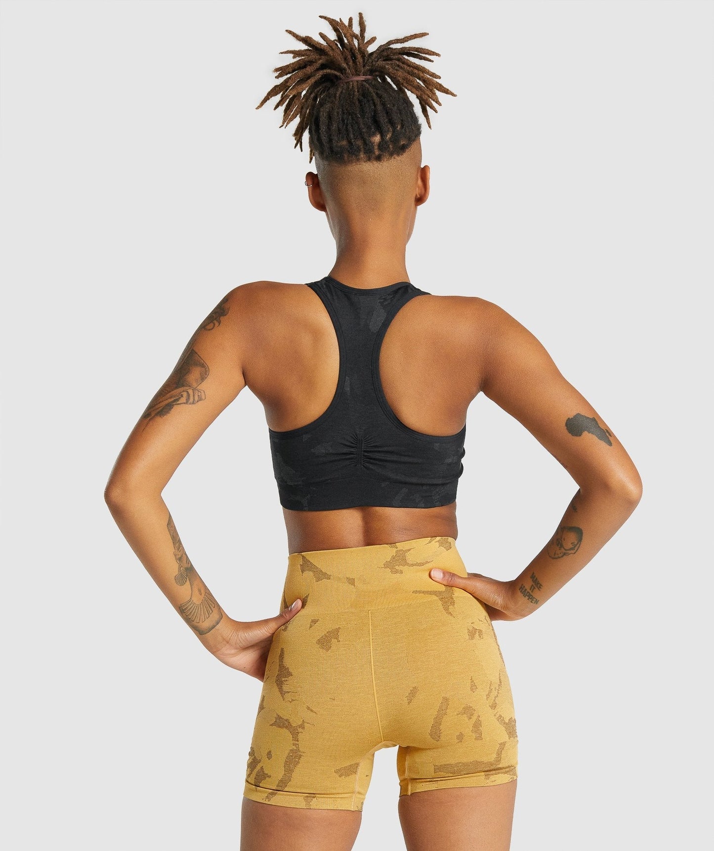 Gymshark Adapt Camo Seamless Racer Back Sports BH - Savanna | Schwarz