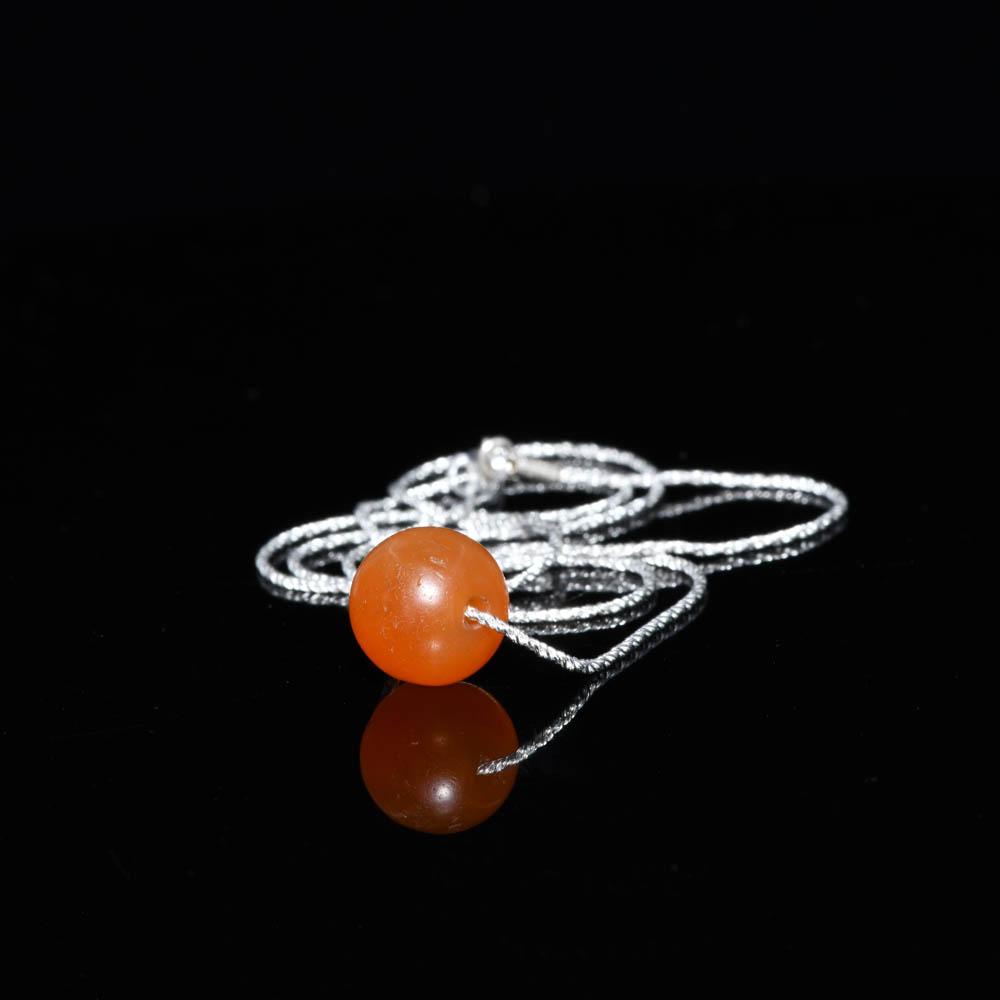 ایک مصری کارنیلین مالا ایک لاکٹ ، مڈل کنگڈم ، سی اے کے طور پر قائم کیا گیا ہے۔ 2017 - 1750 قبل مسیح