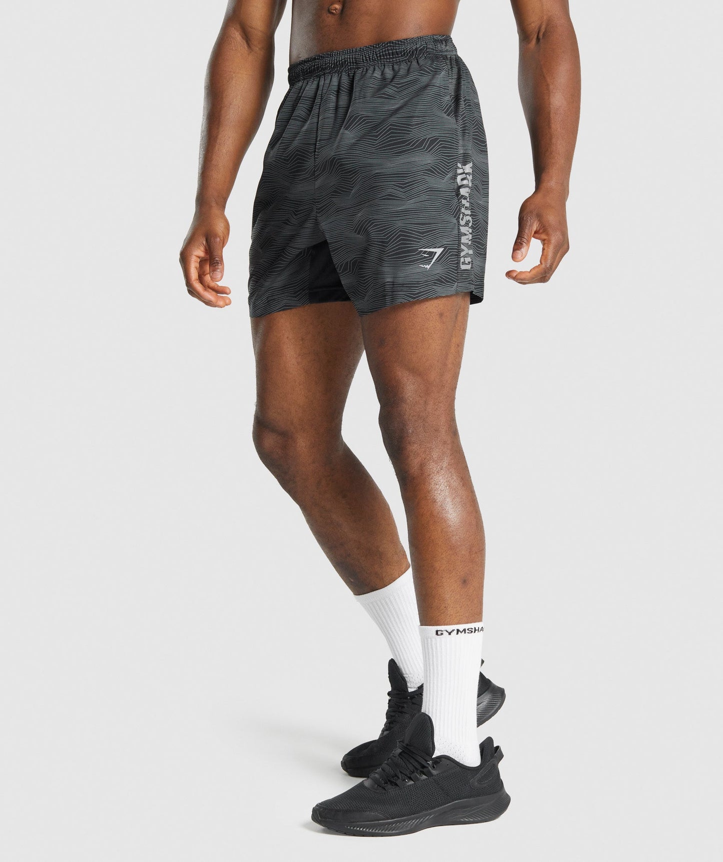 Gymshark Graphic Sport Shorts - Schwarzer Druck