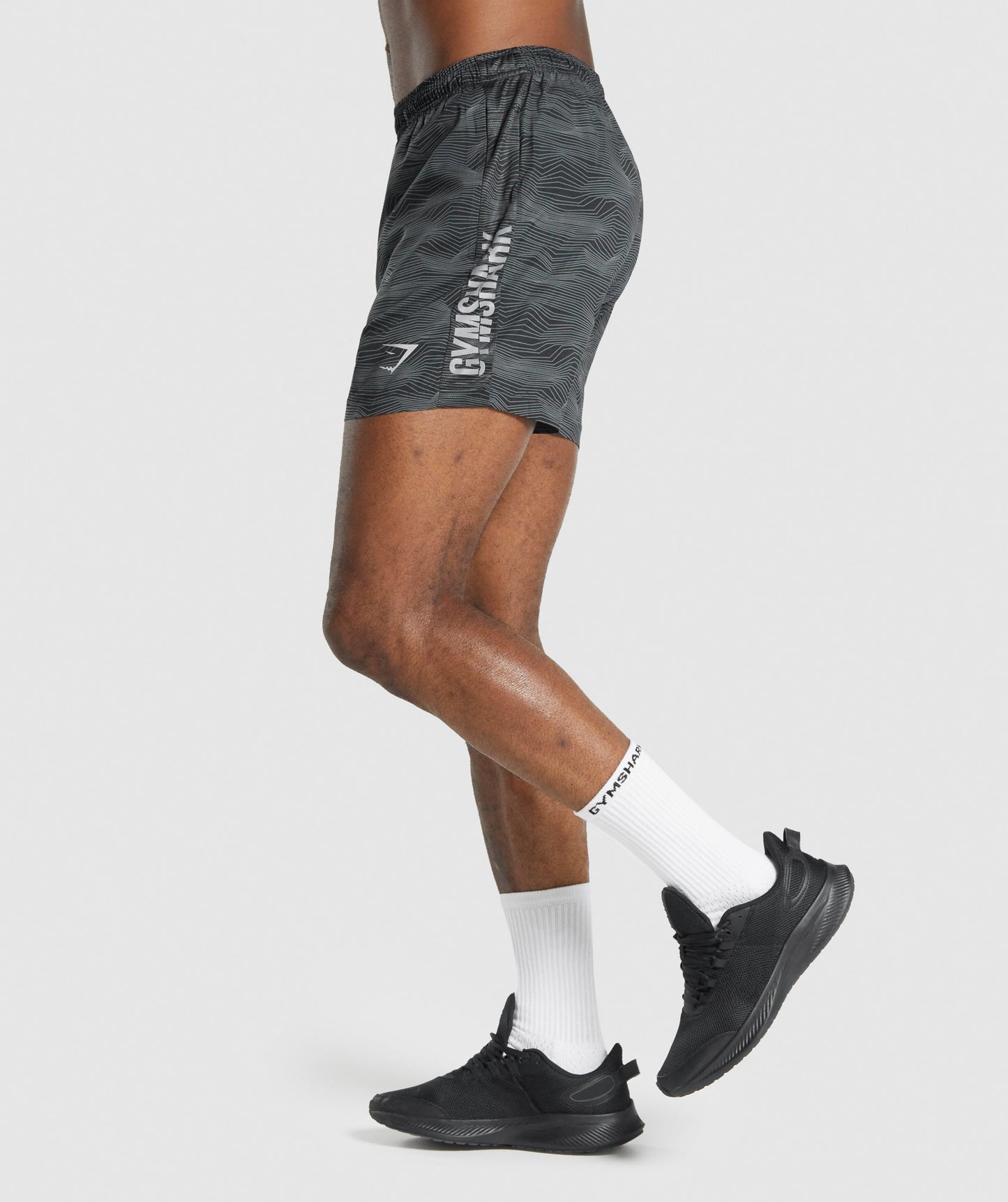 Gymshark Graphic Sport Shorts - Schwarzer Druck