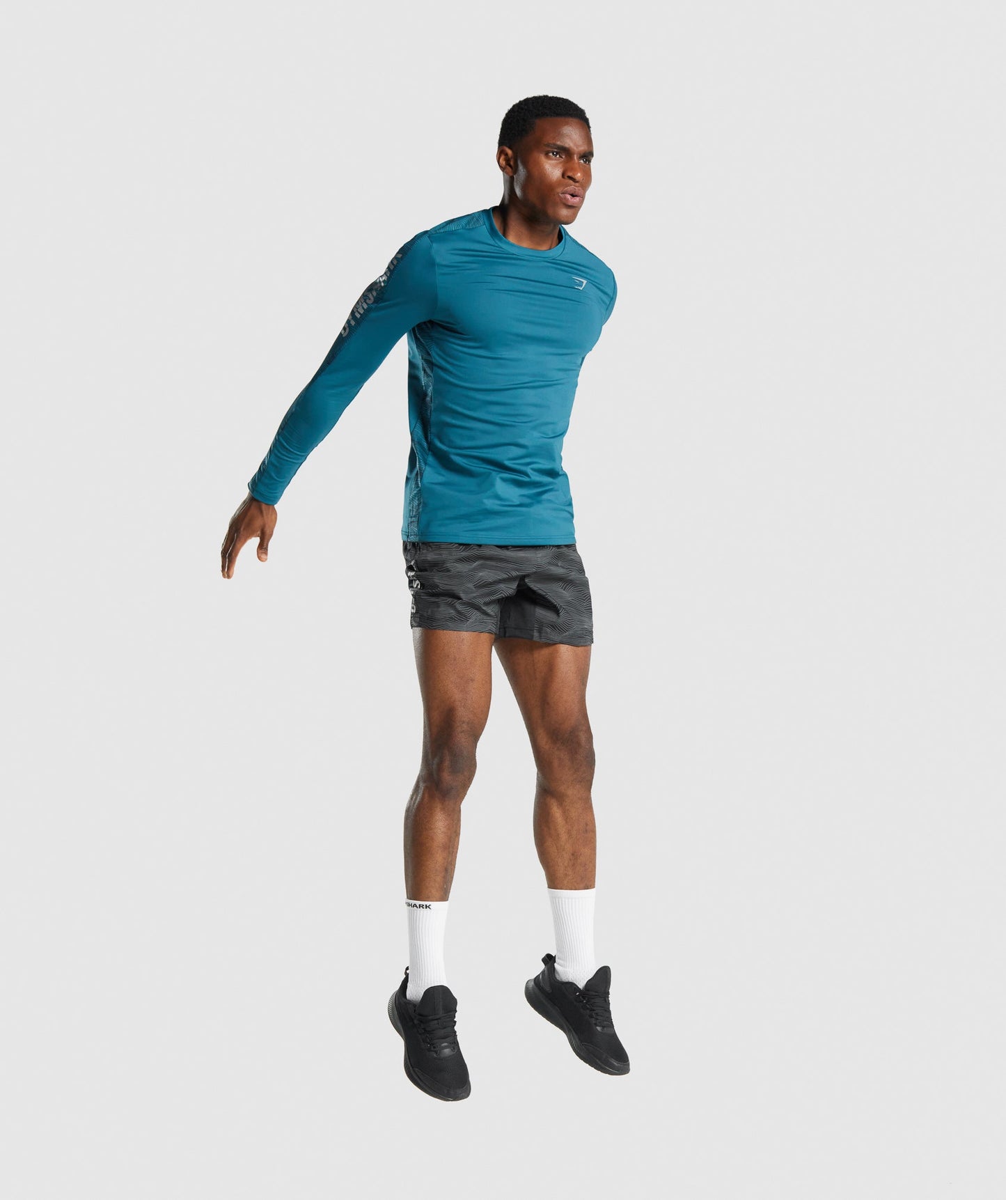 Gymshark Graphic Sport Shorts - Schwarzer Druck