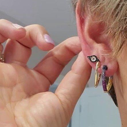 Schwarze Ohrringe mit bösem Blick