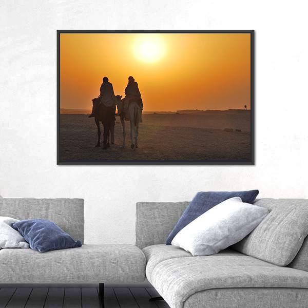 Two Camels Riding Towards Sun In Desert Canvas Wall Art-1 Piece-Floating Frame-24" x 16"-Tiaracle