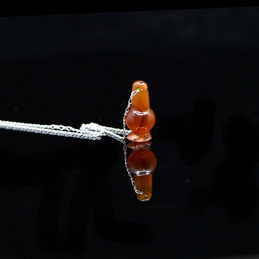 ایک مصری کارنیلین پوست کے مالا لاکٹ ، نیو کنگڈم ، 18 ویں - 19 ویں خاندان ، سی اے۔ 1550 - 1295 قبل مسیح