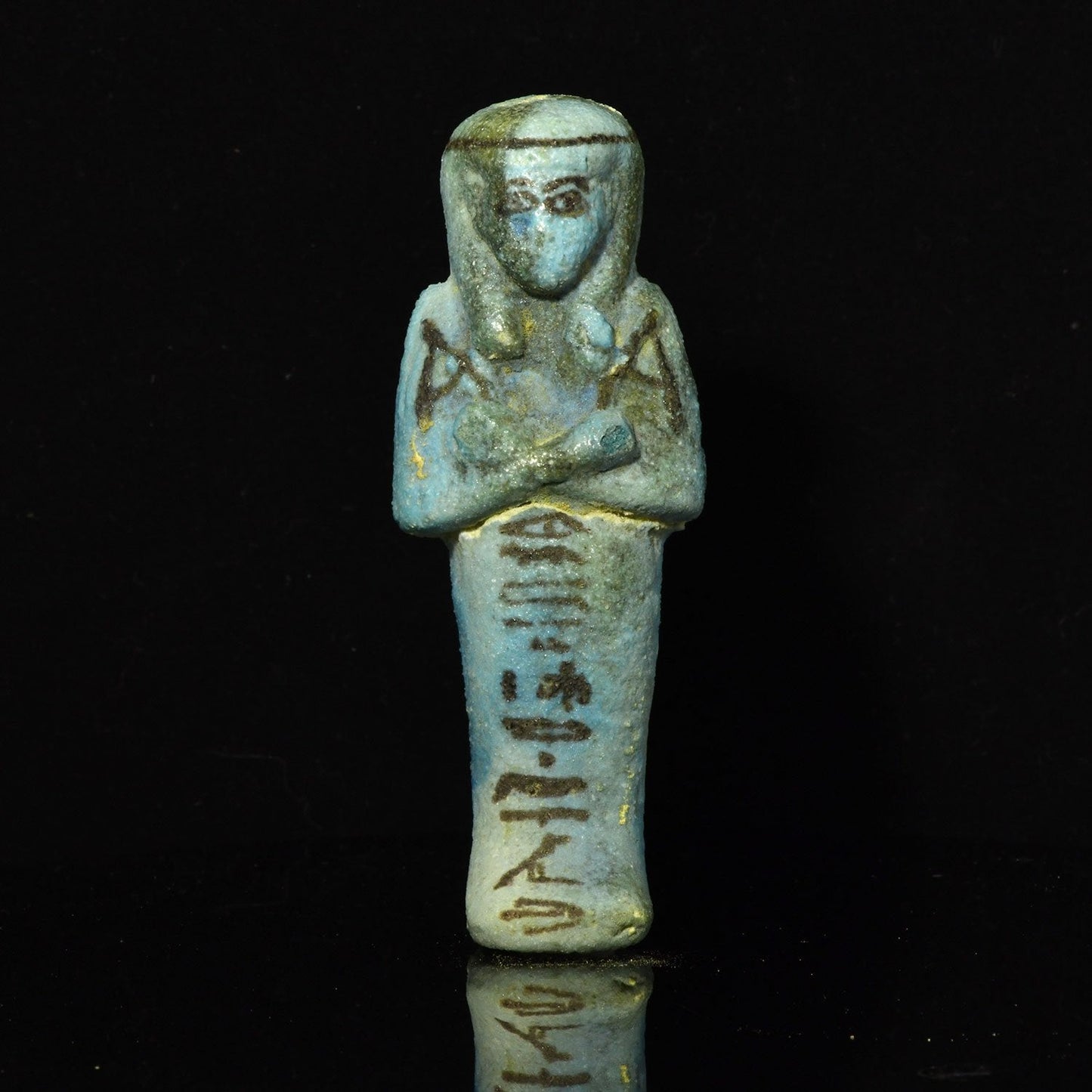 Ein ägyptisches Fayence-Uschebti für Tjenet-Osorkon, 21. Dynastie, ca. 1069 - 945 v. Chr.