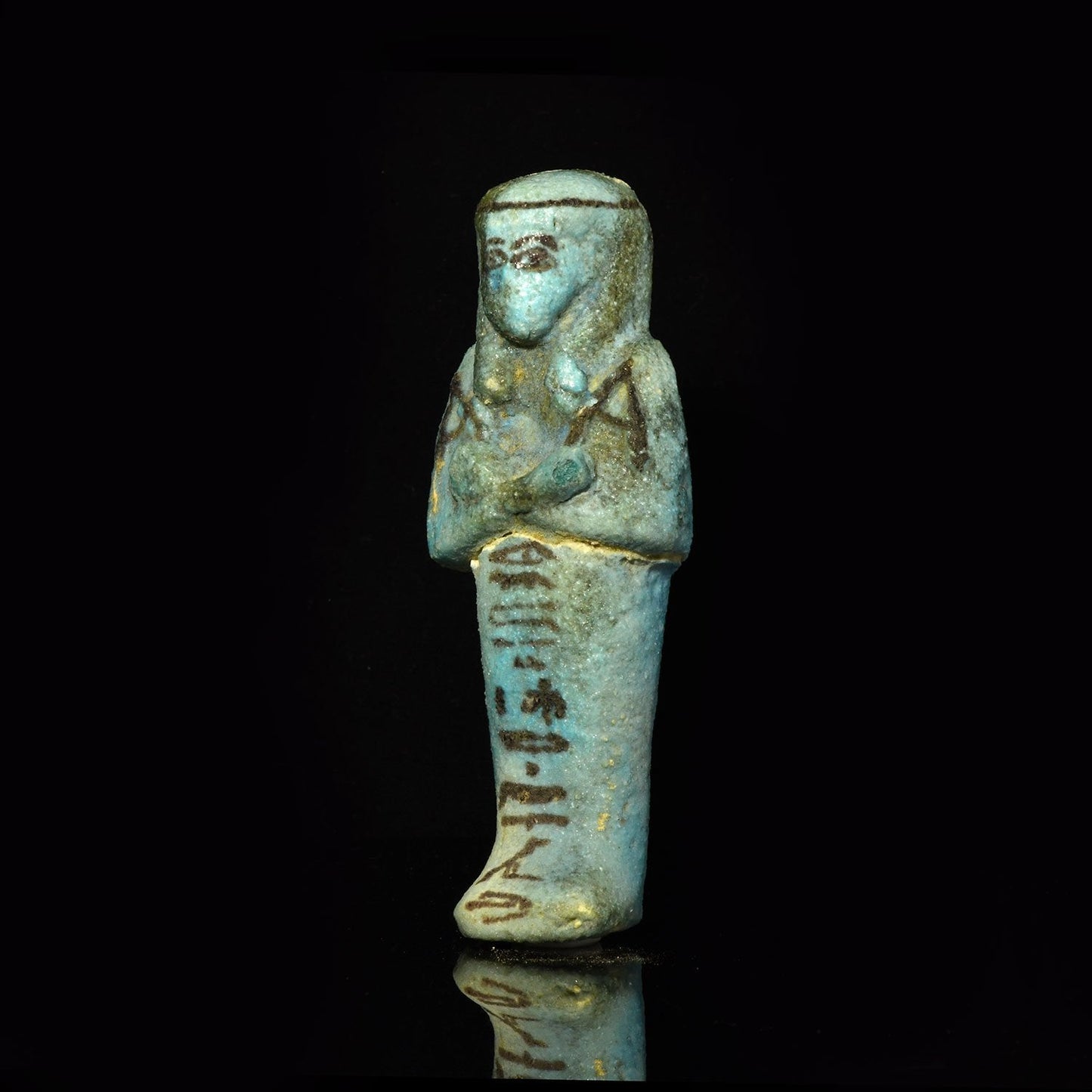 Ein ägyptisches Fayence-Uschebti für Tjenet-Osorkon, 21. Dynastie, ca. 1069 - 945 v. Chr.