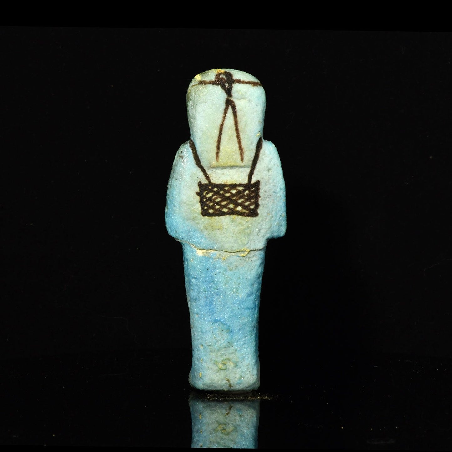 Ein ägyptisches Fayence-Uschebti für Tjenet-Osorkon, 21. Dynastie, ca. 1069 - 945 v. Chr.