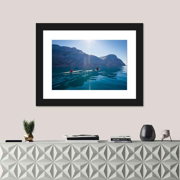 People Kayaking In The Sea Near The Mountains Canvas Wall Art-1 Piece-Framed Print-20" x 16"-Tiaracle