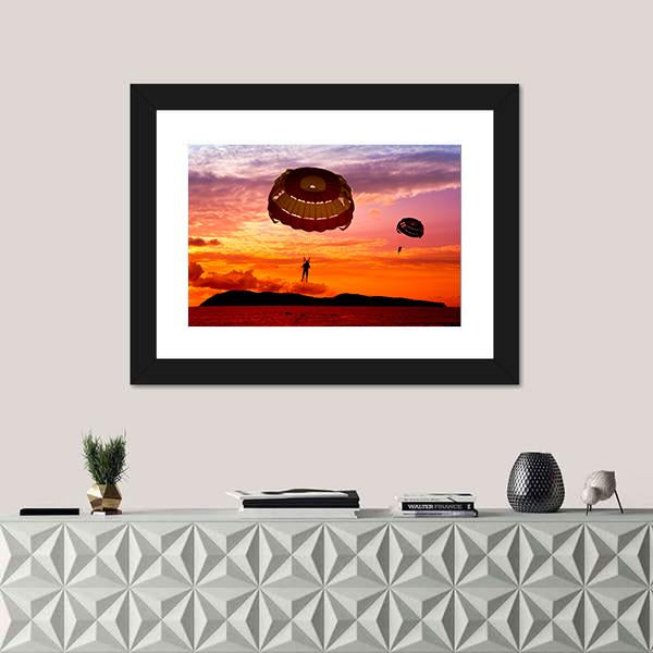 Silhouette Of A Para-Sailors At Sunset Canvas Wall Art-1 Piece-Framed Print-20" x 16"-Tiaracle