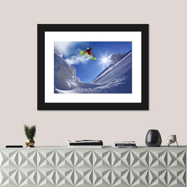 Snowboarder Jumping Against Blue Sky Canvas Wall Art-1 Piece-Framed Print-20" x 16"-Tiaracle