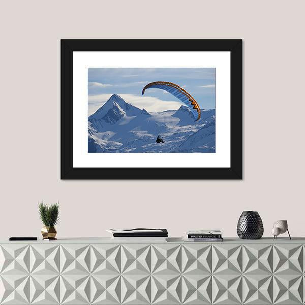 Paragliding Over Mountain In Winter Canvas Wall Art-1 Piece-Framed Print-20" x 16"-Tiaracle