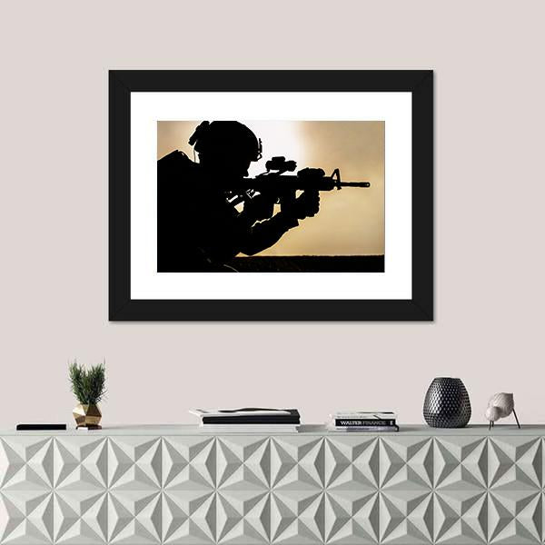 Silhouette Of Young Soldier In Military Helmet Against The Sun Canvas Wall Art-1 Piece-Framed Print-20" x 16"-Tiaracle