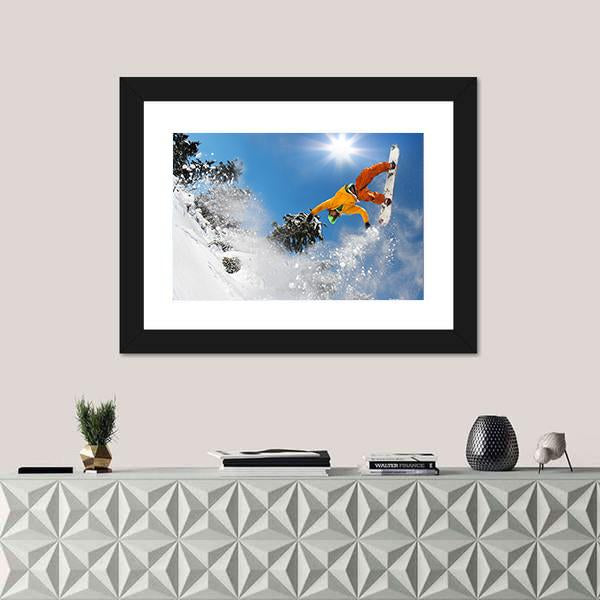 Snowboarder Jumping Against Blue Sky Canvas Wall Art-1 Piece-Framed Print-20" x 16"-Tiaracle