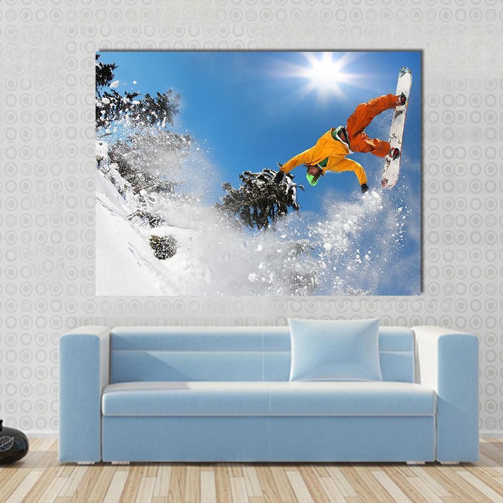 Snowboarder Jumping Against Blue Sky Canvas Wall Art-1 Piece-Gallery Wrap-48" x 32"-Tiaracle