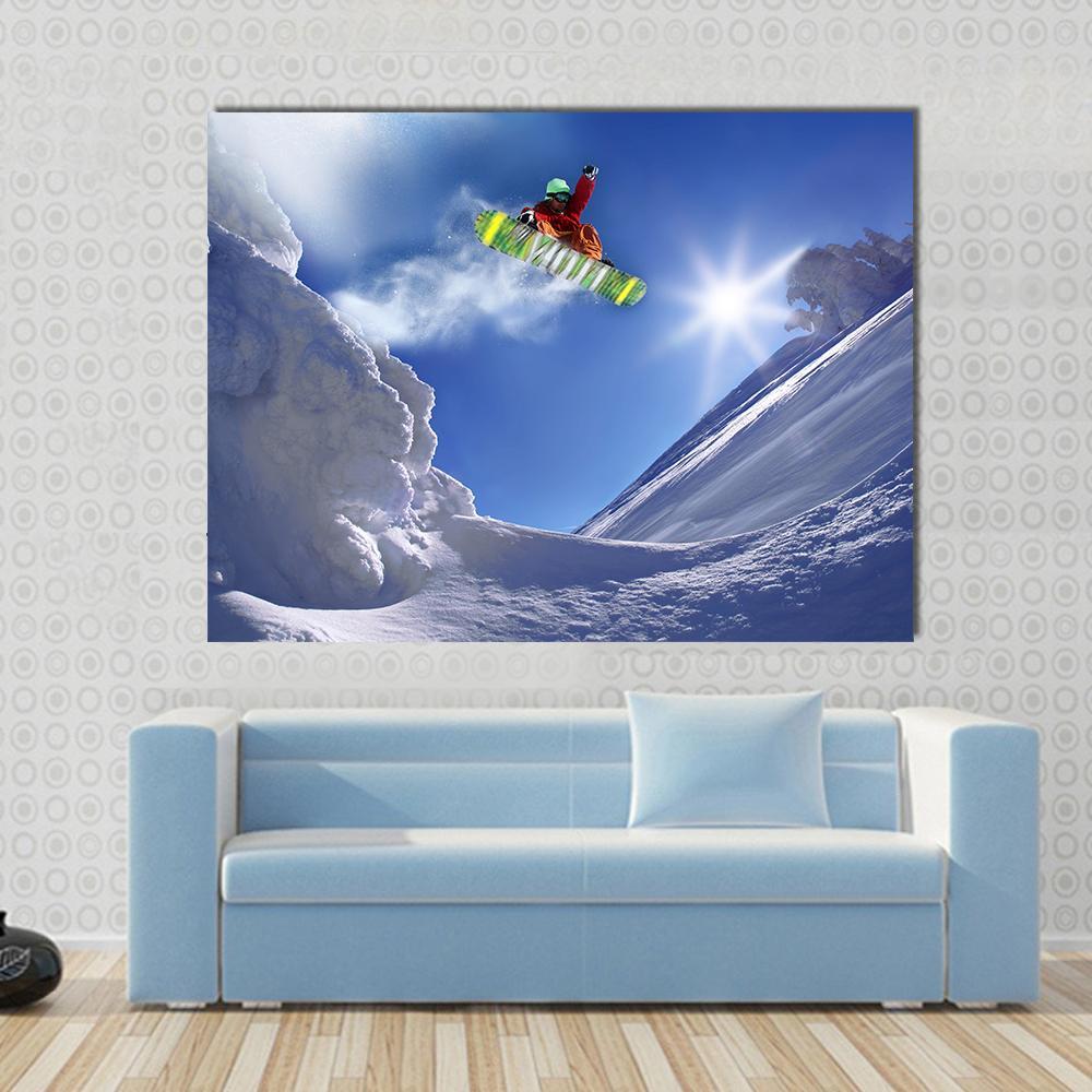 Snowboarder Jumping Against Blue Sky Canvas Wall Art-1 Piece-Gallery Wrap-48" x 32"-Tiaracle