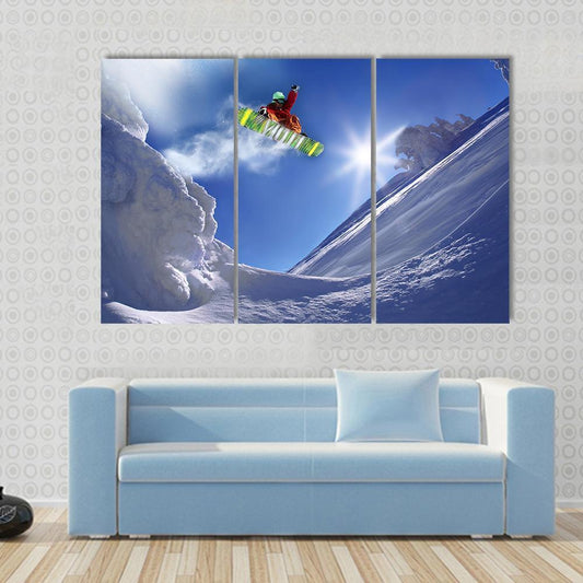 Snowboarder Jumping Against Blue Sky Canvas Wall Art-3 Horizontal-Gallery Wrap-37" x 24"-Tiaracle