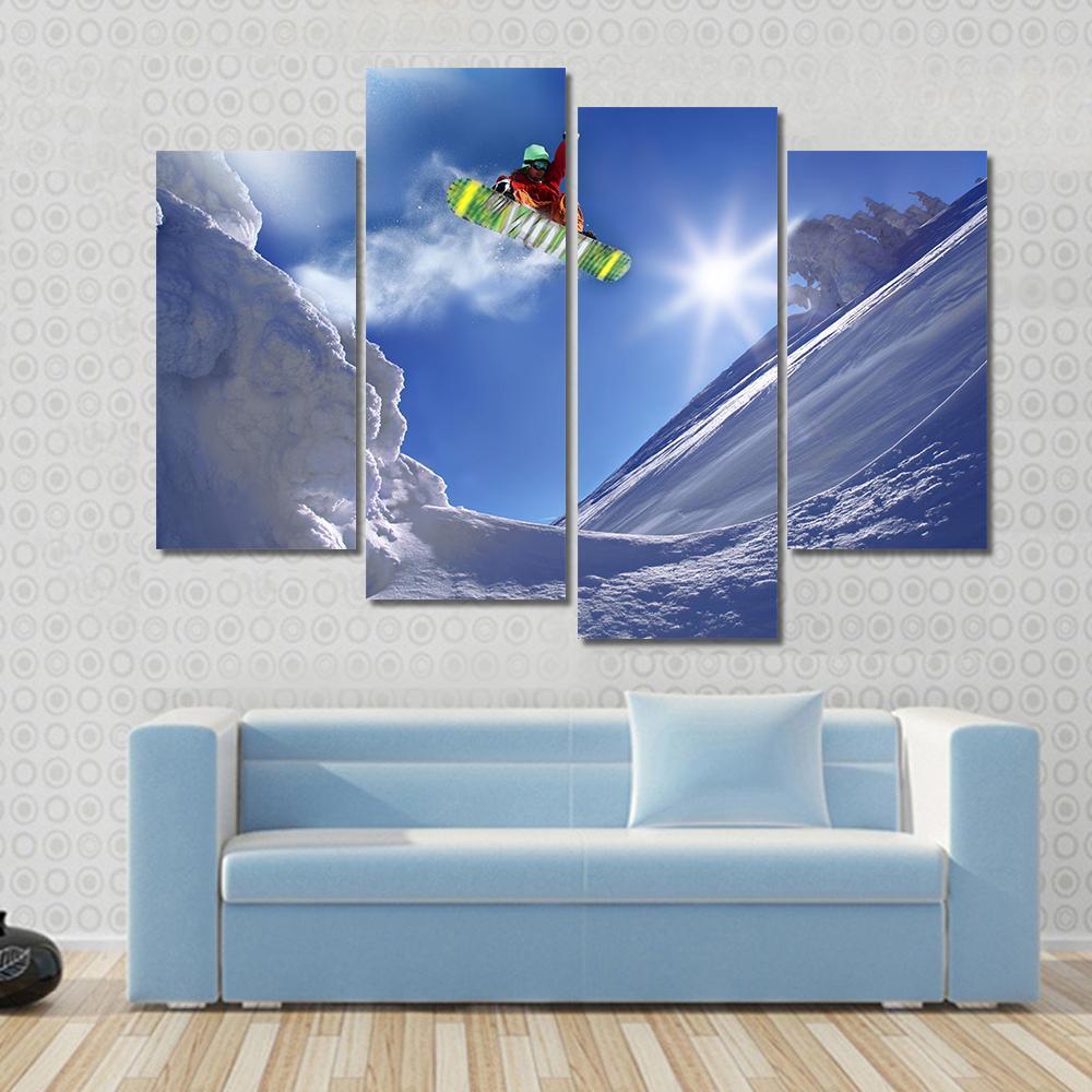 Snowboarder Jumping Against Blue Sky Canvas Wall Art-4 Pop-Gallery Wrap-50" x 32"-Tiaracle