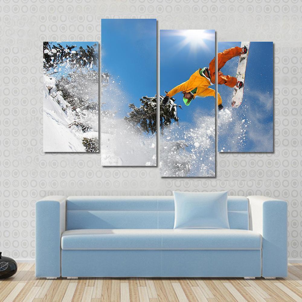 Snowboarder Jumping Against Blue Sky Canvas Wall Art-4 Pop-Gallery Wrap-50" x 32"-Tiaracle