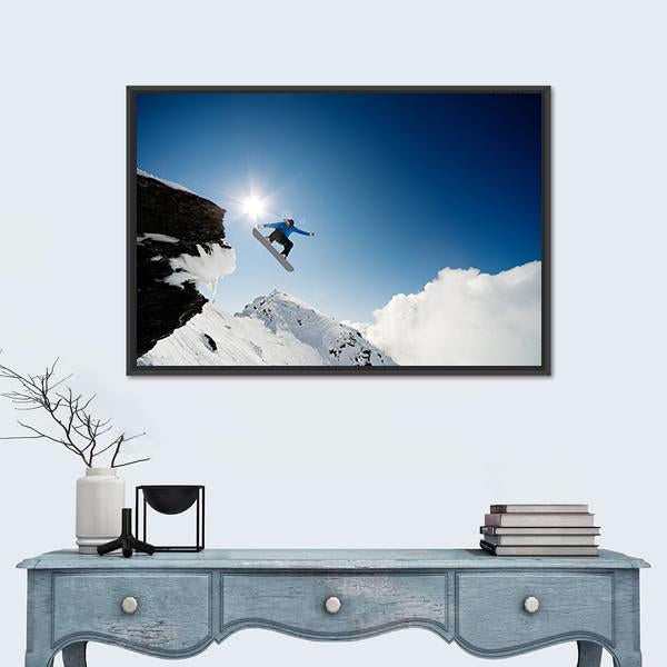 Snowboarder Jumping Through Air After Rock Drop Canvas Wall Art-1 Piece-Floating Frame-24" x 16"-Tiaracle