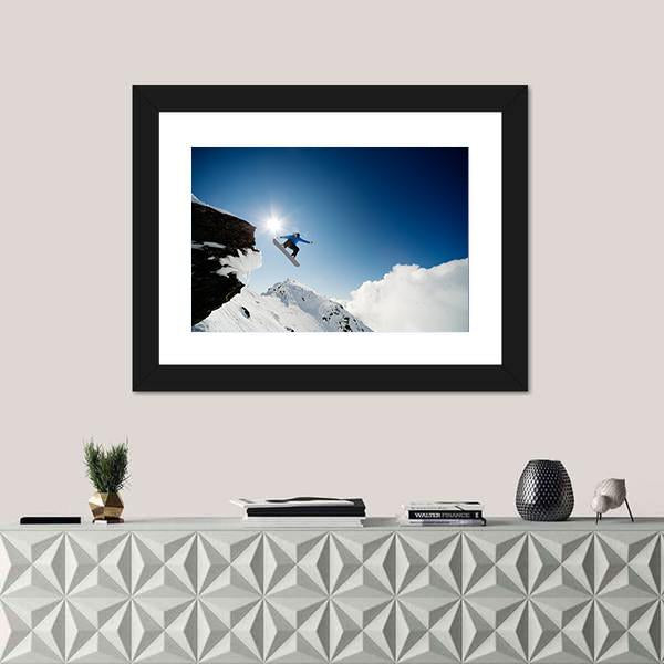 Snowboarder Jumping Through Air After Rock Drop Canvas Wall Art-1 Piece-Framed Print-20" x 16"-Tiaracle