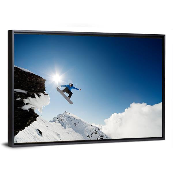 Snowboarder Jumping Through Air After Rock Drop Canvas Wall Art-3 Horizontal-Gallery Wrap-25" x 16"-Tiaracle