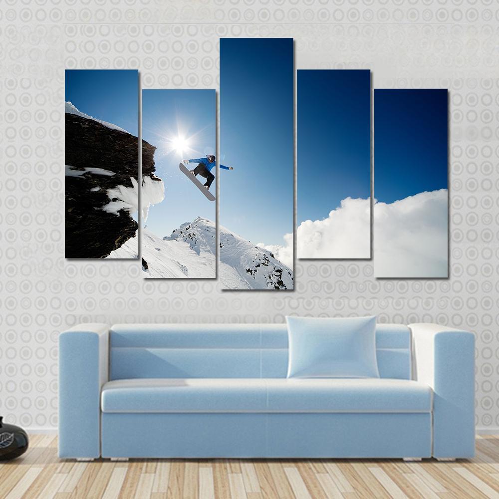 Snowboarder Jumping Through Air After Rock Drop Canvas Wall Art-5 Pop-Gallery Wrap-47" x 32"-Tiaracle