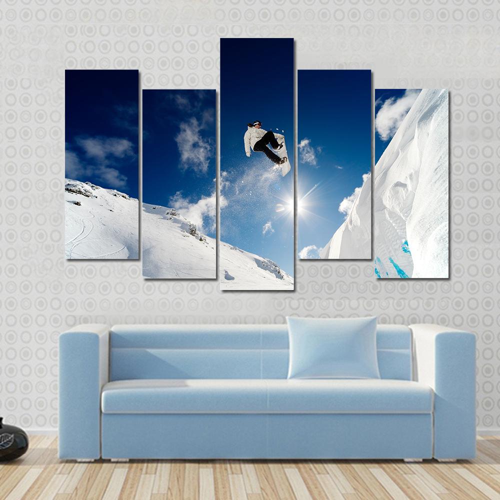 Snowboarder Jumping Through The Air With Blue Sky Canvas Wall Art-5 Pop-Gallery Wrap-47" x 32"-Tiaracle