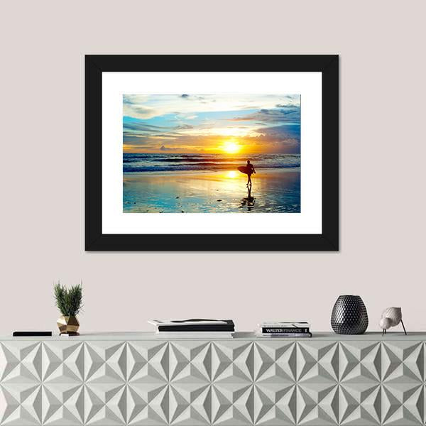 Surfer On The Ocean Beach At Sunset On Bali Island Indonesia Canvas Wall Art-1 Piece-Framed Print-20" x 16"-Tiaracle