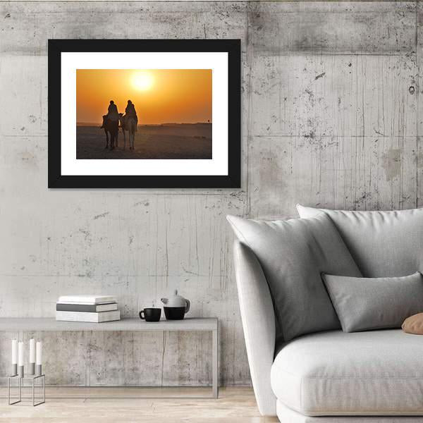 Two Camels Riding Towards Sun In Desert Canvas Wall Art-3 Horizontal-Gallery Wrap-25" x 16"-Tiaracle