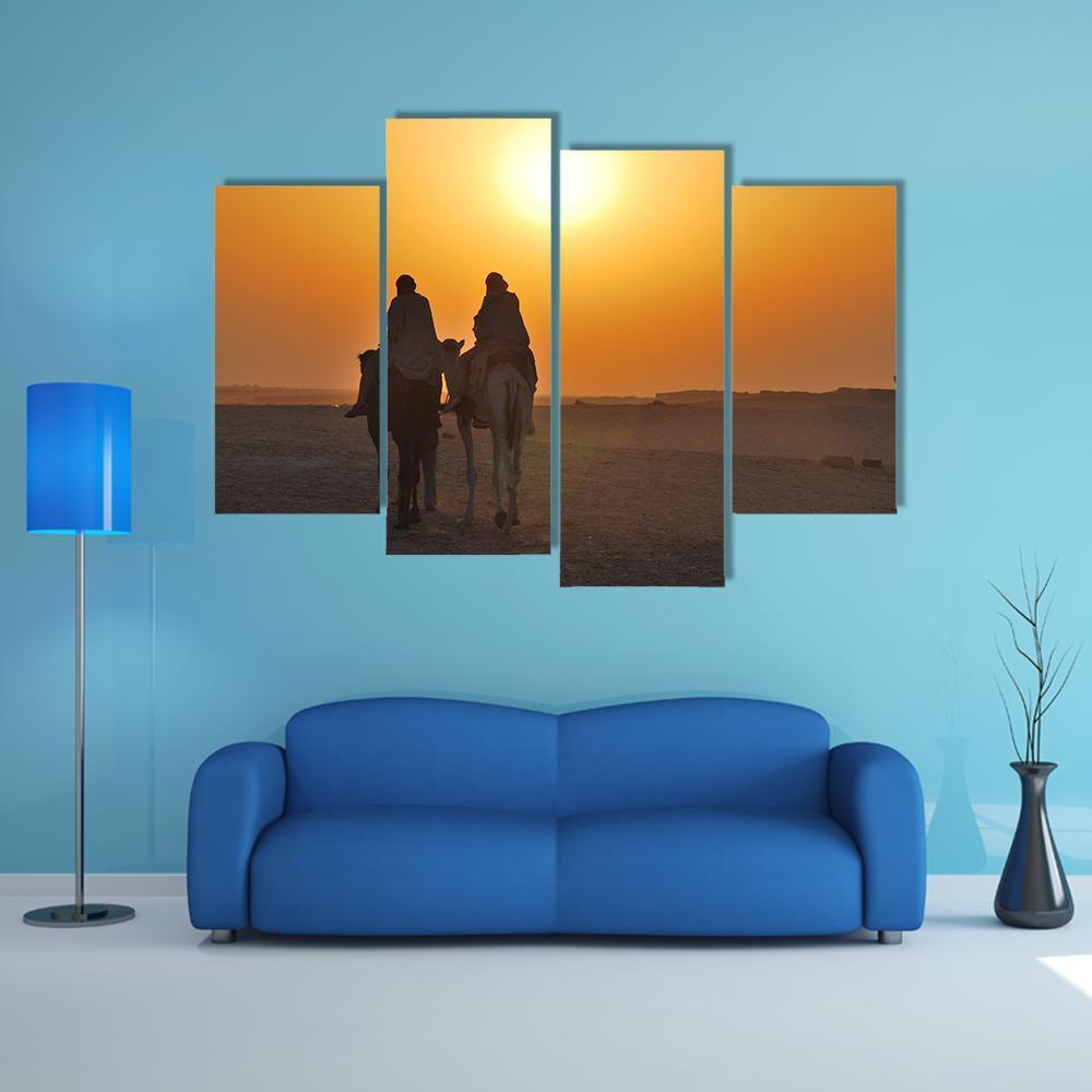 Two Camels Riding Towards Sun In Desert Canvas Wall Art-4 Pop-Gallery Wrap-50" x 32"-Tiaracle
