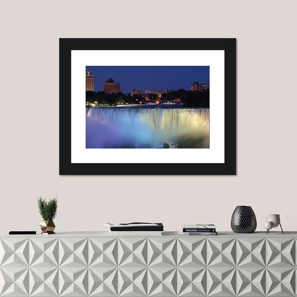 Waterfall With City At Night Above With Lights Canvas Wall Art-1 Piece-Framed Print-20" x 16"-Tiaracle