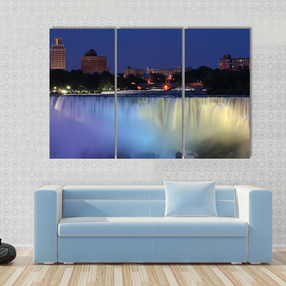 Waterfall With City At Night Above With Lights Canvas Wall Art-3 Horizontal-Gallery Wrap-37" x 24"-Tiaracle