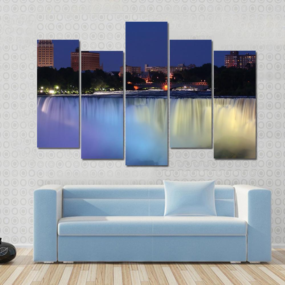 Waterfall With City At Night Above With Lights Canvas Wall Art-5 Pop-Gallery Wrap-47" x 32"-Tiaracle