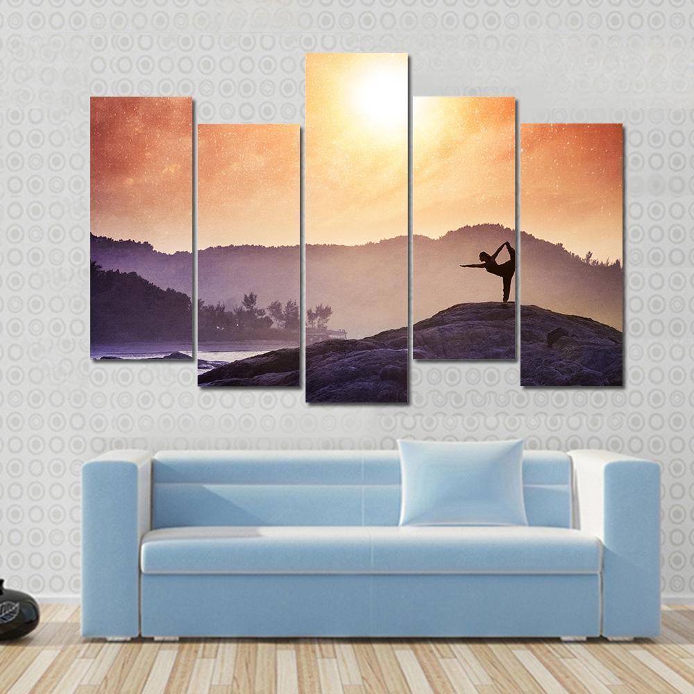 Woman Doing Yoga Natarajasana Dancer Pose On The Rocks At Sunset Canvas Wall Art-5 Pop-Gallery Wrap-47" x 32"-Tiaracle